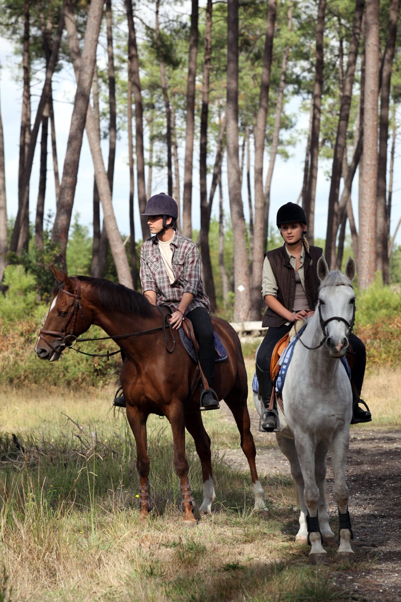 Man,And,Woman,Riding,Horses