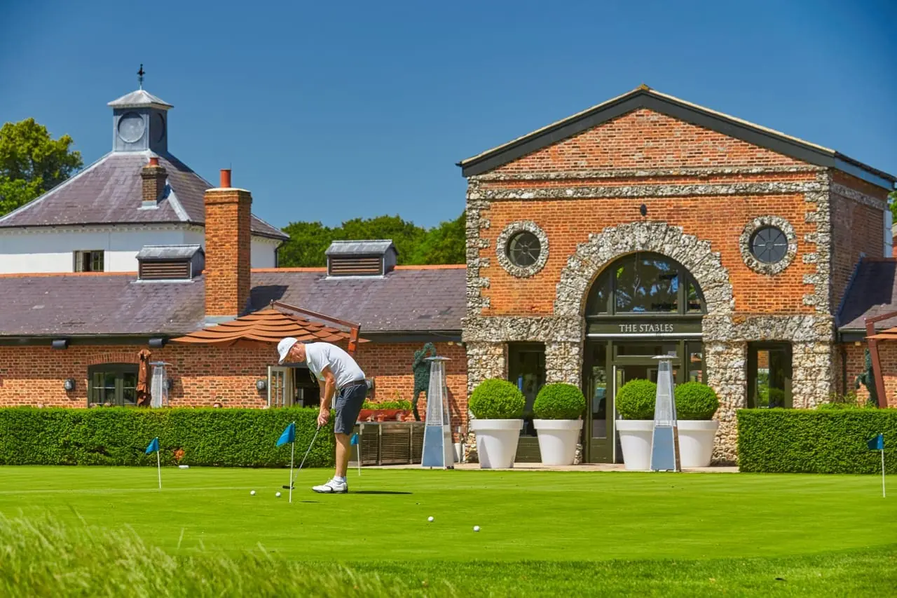 the putting green with stables