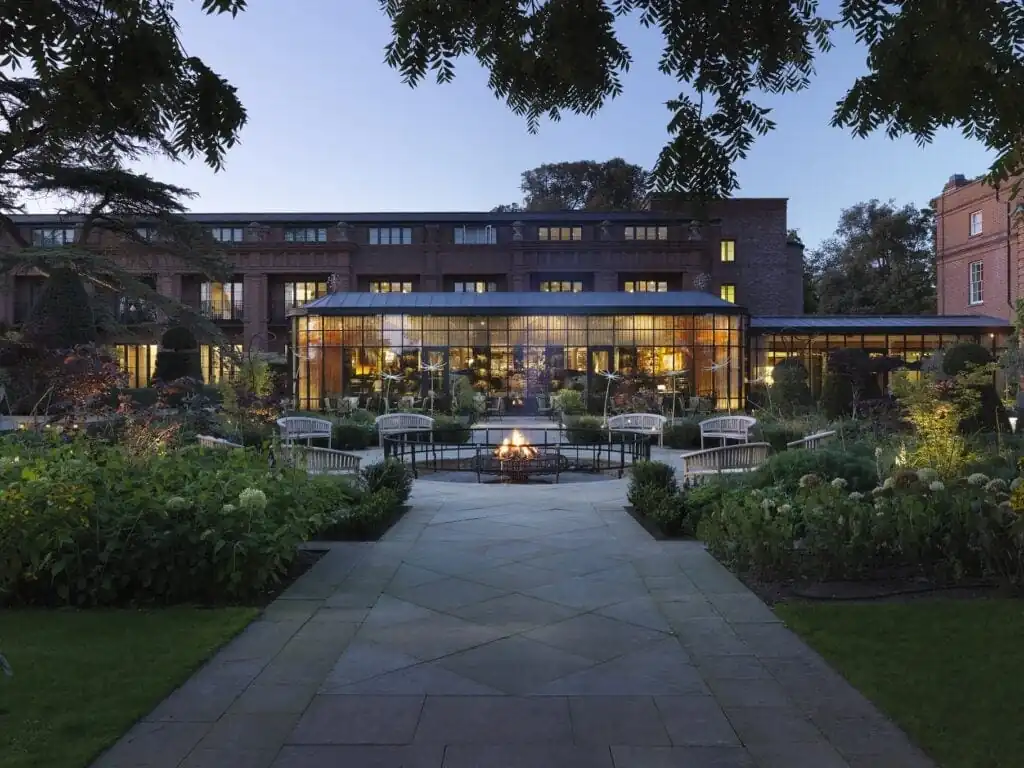 The Grove at night with outdoor seating