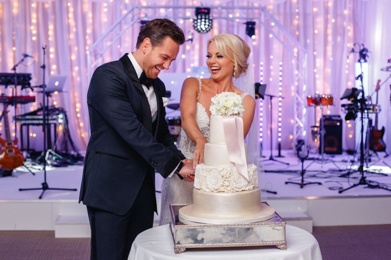 cutting a wedding cake