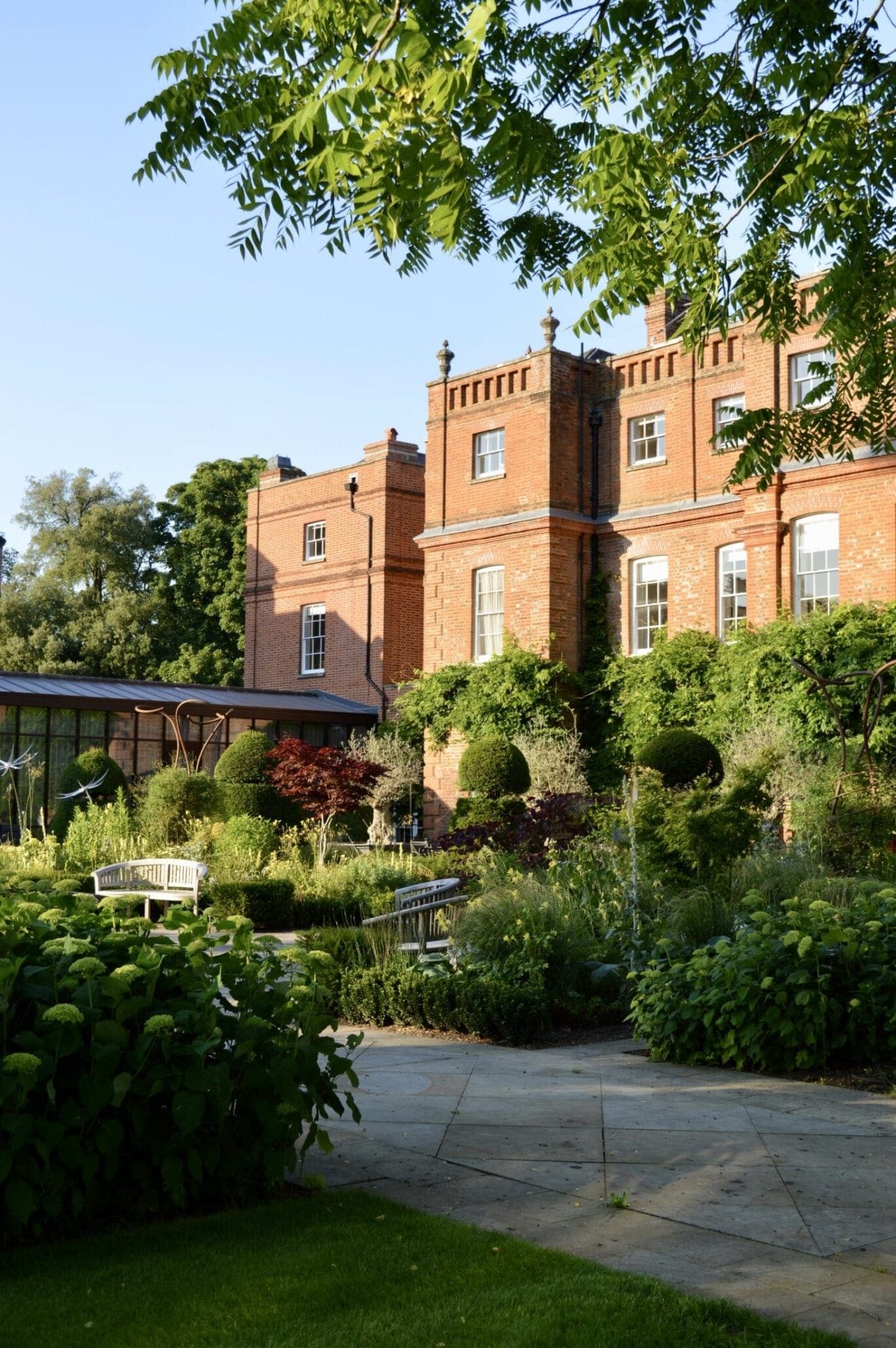 Formal gardens and mansion