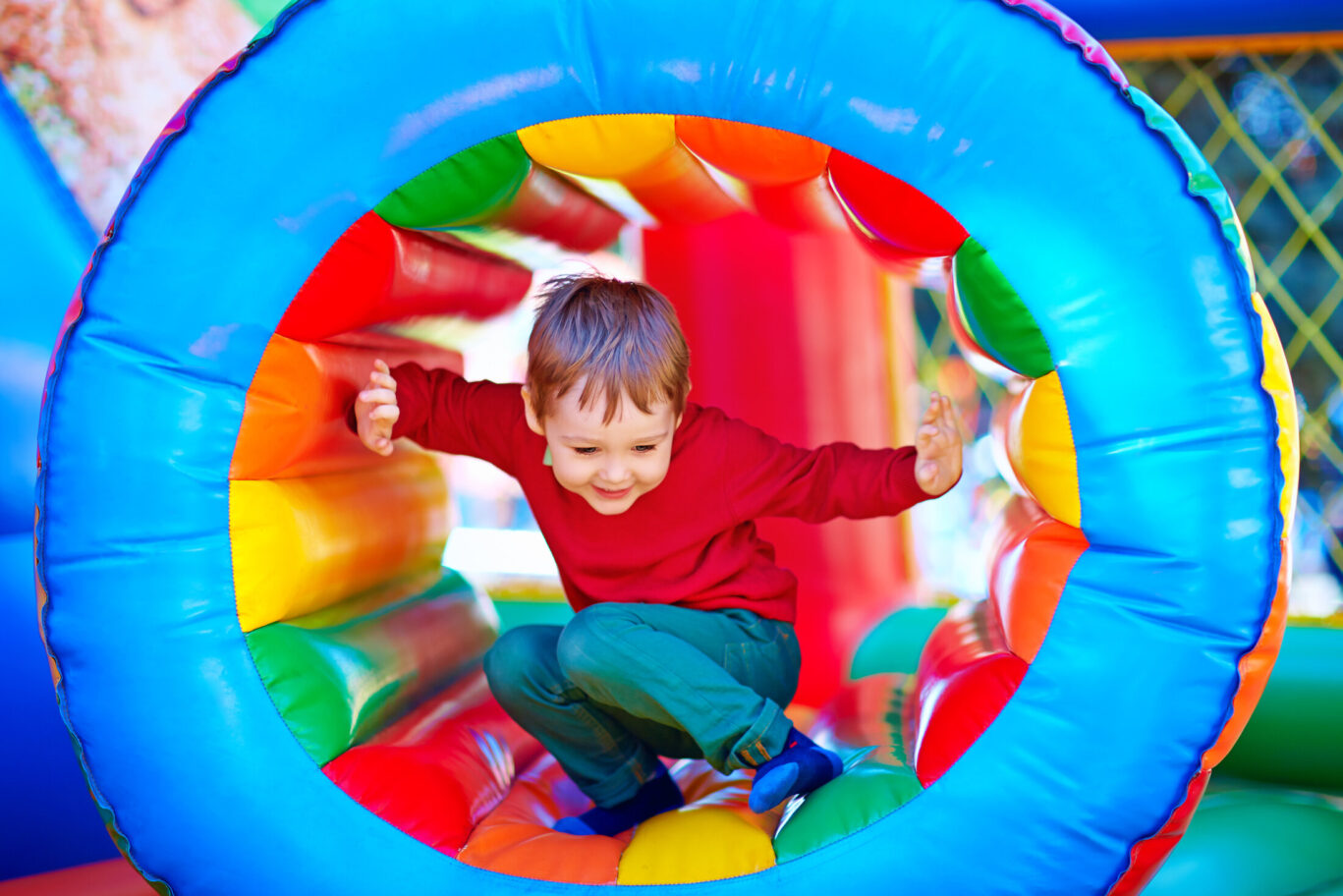 Boy playing on inflatable