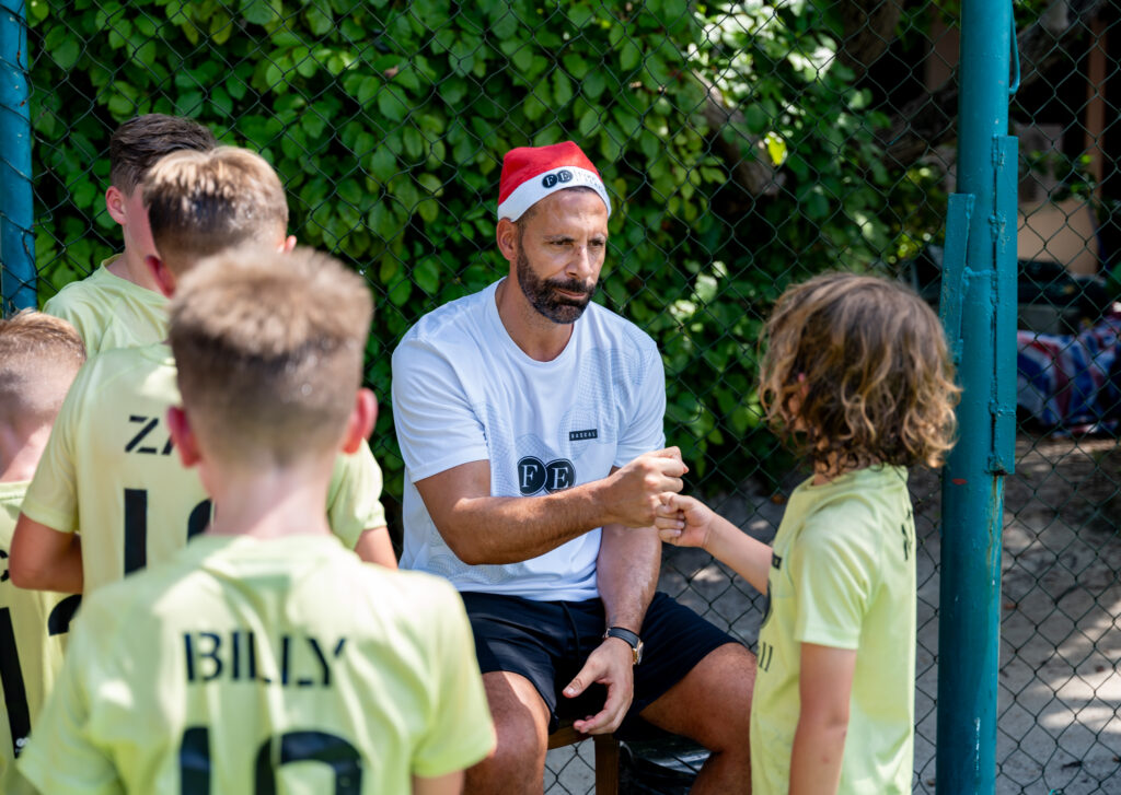 Rio Ferdinand interacting with the kids at Football Escapes