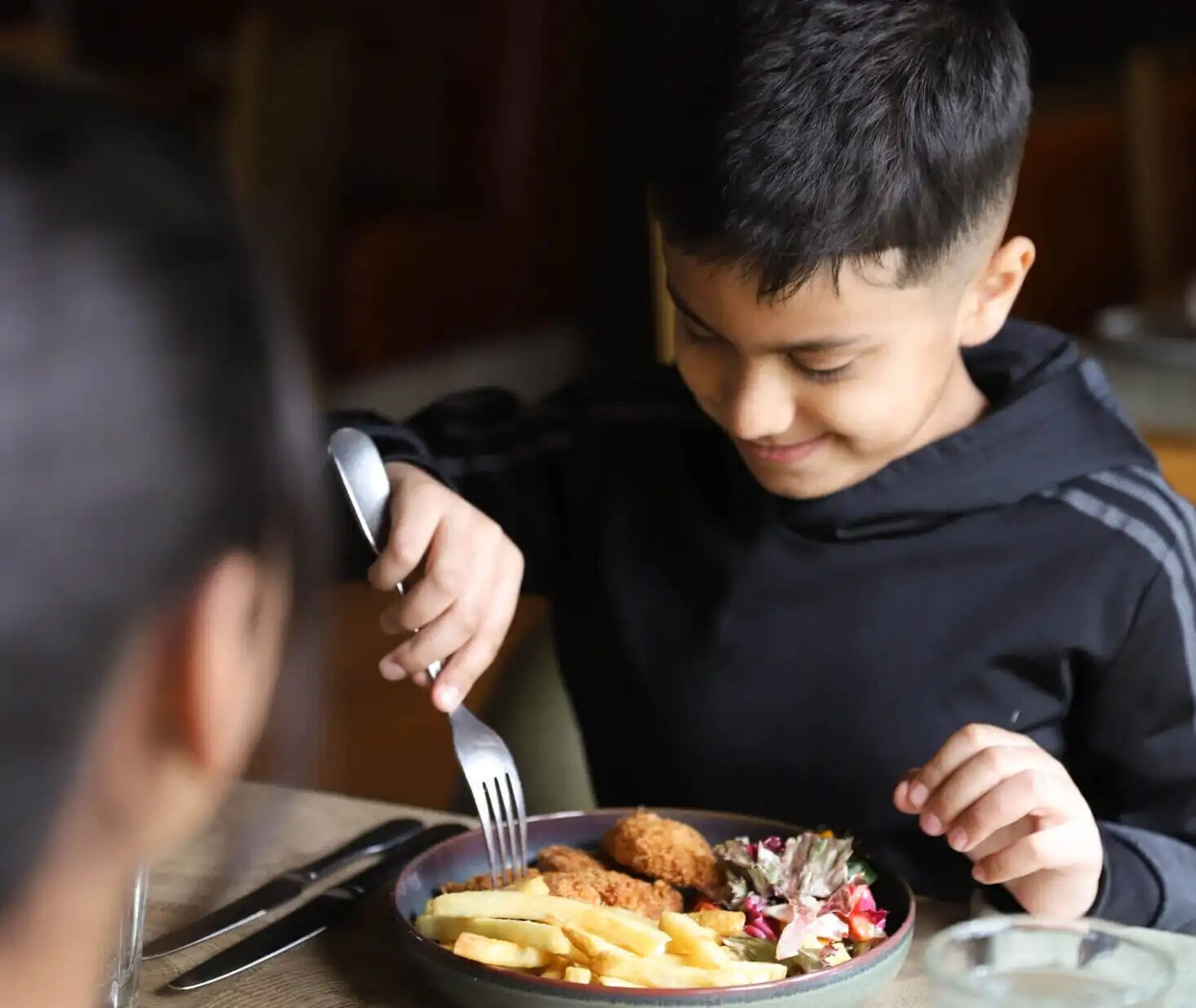 Kids fish and chips in The Stables